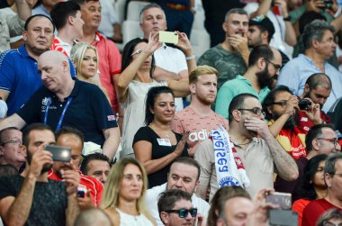Istanbul, Turkey - August 14, 2019: Football  fans and spectators during the UEFA Super Cup Finals match between Liverpool and Chelsea at Vodafone Park in Vodafone Arena, Turkey