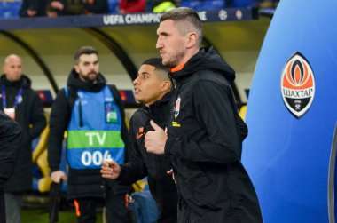 KHARKIV, UKRAINE - December 11, 2019: Shakhtar Football players enters on the pith during the UEFA Champions League match between Shakhtar vs Atalanta BC (Italy), Ukraine