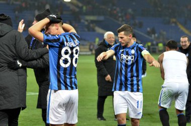 KHARKIV, UKRAINE - December 11, 2019: Atalanta player celebrate their team getting to the next round of the 1/8 finals Champions League, Ukraine
