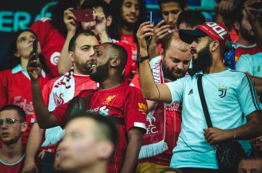 Istanbul, Turkey - August 14, 2019: Liverpool Football fans and spectators during the UEFA Super Cup Finals match between Liverpool and Chelsea at Vodafone Park in Vodafon Arena, Turkey