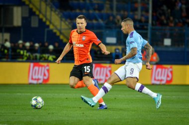KHARKIV, UKRAINE - September 18, 2019: Gabriel Jesus and Yevgen Konoplyanka during the UEFA Champions League match between Shakhtar vs Manchester City, Ukraine