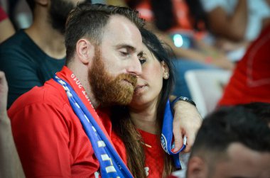 Istanbul, Turkey - August 14, 2019: Liverpool Football fans and spectators during the UEFA Super Cup Finals match between Liverpool and Chelsea at Vodafone Park in Vodafon Arena, Turkey
