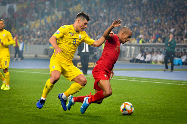 KYIV, UKRAINE - October 14, 2019: Ruslan Malinovskyi and Joao Mario during the UEFA EURO 2020 qualifying match between national team Ukraine against Portugal team, Ukraine