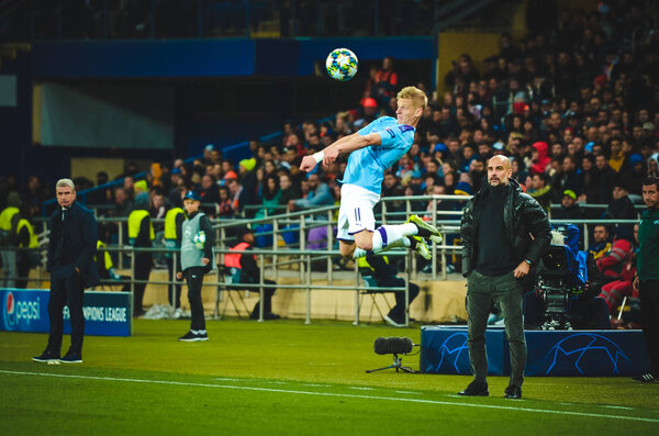 KHARKIV, UKRAINE - September 18, 2019: Oleksandr Zinchenko and Pep Guardiola during the UEFA Champions League match between Shakhtar vs Manchester City, Ukraine