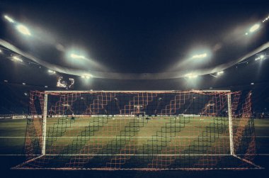 KHARKIV, UKRAINE - Febriary 20, 2020: General view of the football stadium in Kharkov Osk Metalist from the inside behind the gate during the UEFA Europe League match, Ukraine