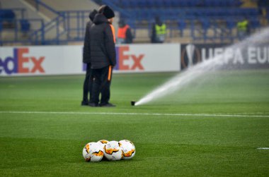 KHARKIV, UKRAINE - Febriary 20, 2020: Europa League balls lie nearby on the field during the UEFA Europe League match between Shakhtar Donetsk vs SL Benfica (Portugal), Ukraine