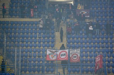 KHARKIV, UKRAINE - Febriary 20, 2020: SL Benfica Football fans suppport their team during the UEFA Europe League match between Shakhtar Donetsk vs SL Benfica (Portugal), Ukraine