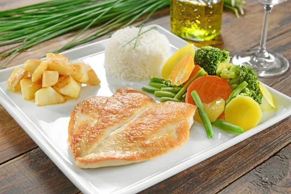 Chicken breast fillet with rice and vegetables