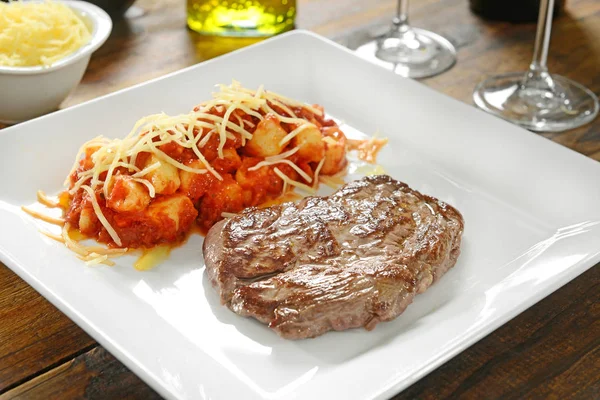 Beef fillet with red sauce gnocchi