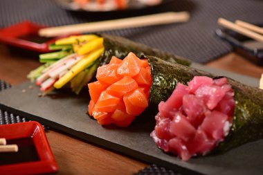 Three temaki sushis