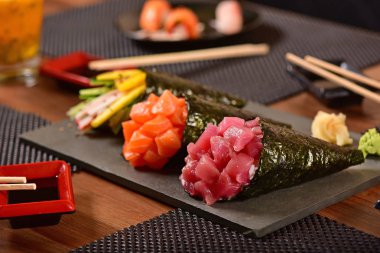 Three temaki sushis