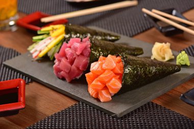 Three temaki sushis