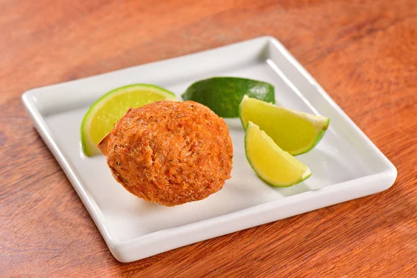 Crab cake on white plate — Stock Photo, Image