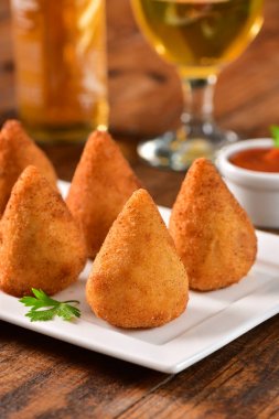 Tablo bar üzerinde Coxinhas