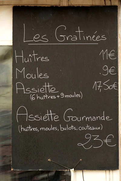 Shellfish menu in Bouziges restaurant — Stock Photo, Image