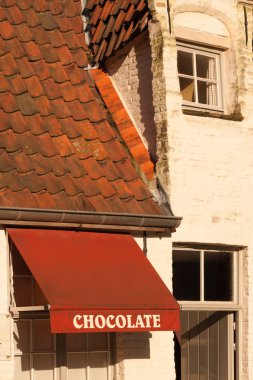 Chocolate shop in typical old building in historic part of Bruges, Belgium