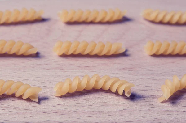 Italian noodles. Pasta girandole types close up