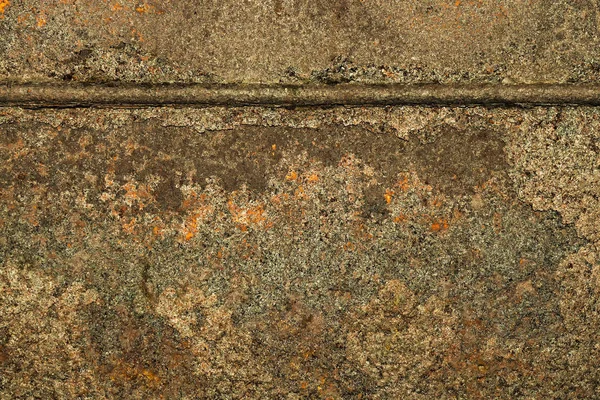 Fragment av slående metallplåt med svetsning. Texturell bakgrund. Närbild. — Stockfoto