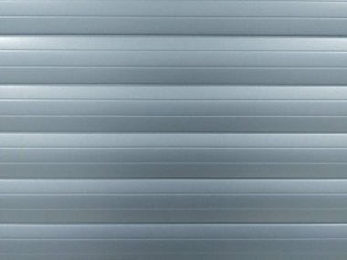 Soyut gri doku arkaplanı. Eğimli yatay çizgiler. Ön görünüm.