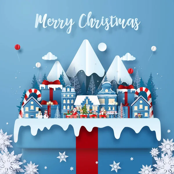 Origami Kartpostal Sanatı. Noel Baba 'yla birlikte büyük bir hediye kutusunda. Mutlu Noeller ve mutlu yıllar.