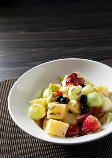 Delicious fruit salad, colorful fruit salad on table