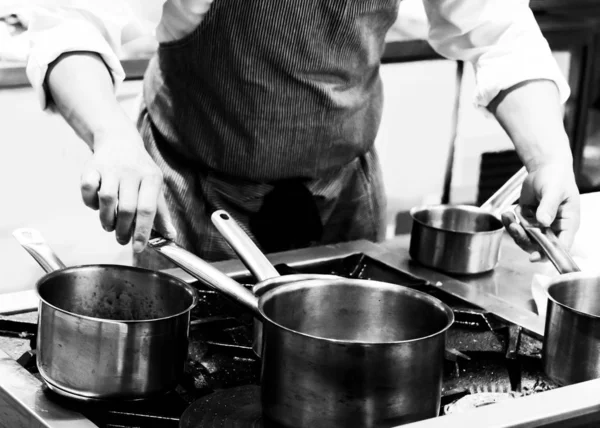 Chef cooking in a kitchen, chef at work, Black & Whit