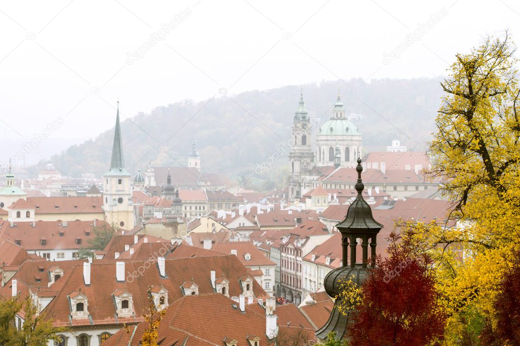 View to the Old Town in foggy autumn day. Prague. Czech Republic.