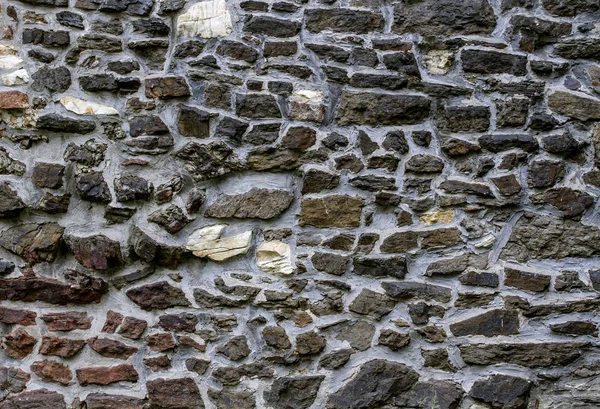 Stary kamienny mur jako tło lub tekstury. — Zdjęcie stockowe