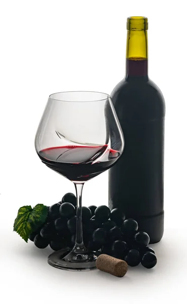 Fles en glas met rode wijn — Stockfoto