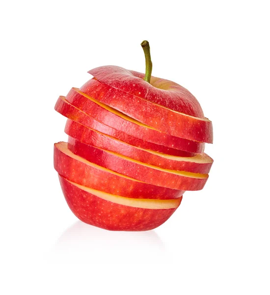 Нарезанное красное яблоко с нарезкой — стоковое фото