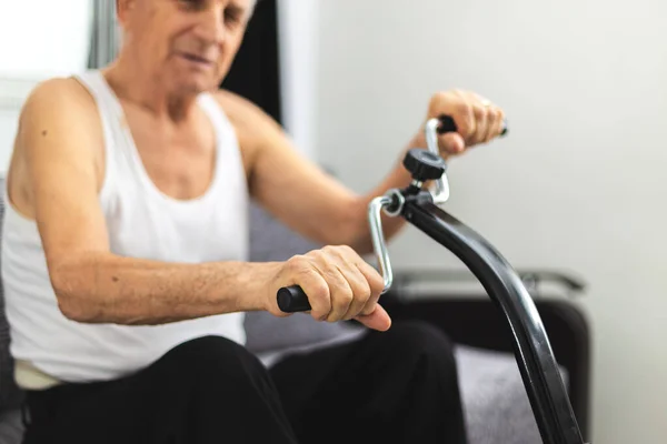 Senior man training at home — Stock Image Senior man training at home Stock Photo
