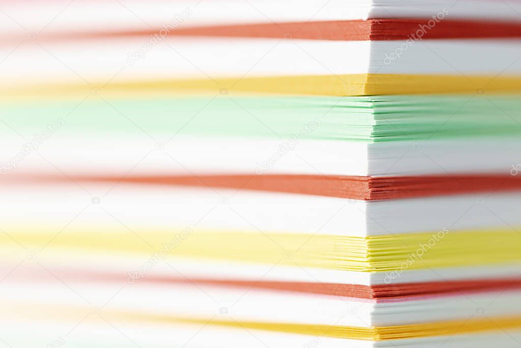 Stack of Colored layers of papers, macro shot.