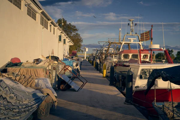Fishing boat moored and lined up with some nets, horizontal — Stock Image Fishing Boat Moored Lined Some Nets Horizontal Royalty Free Stock Images