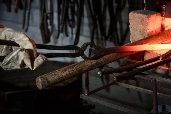 red-hot glands in the work of a blacksmith