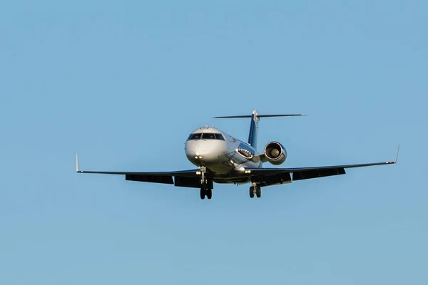 Large passenger plane on a blue sky background — Stock Photo, Image