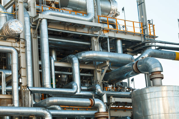 colored buildings and structures in the territory of a large factory