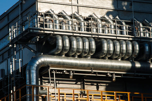 Equipment, cables and piping at modern industrial power plant