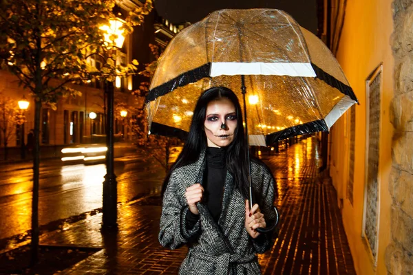 young girl with make-up of skeleton. Halloween