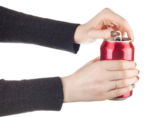 Manos femeninas abriendo una lata de refresco Imágenes de stock libres de derechos