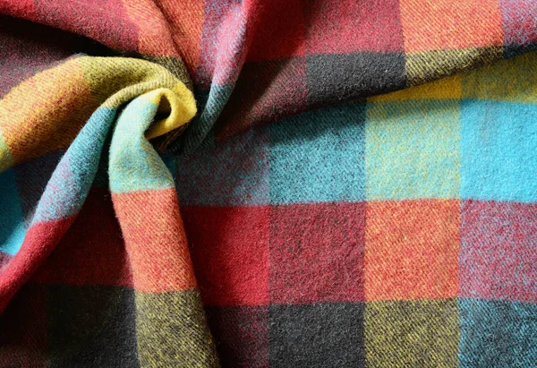 Primo piano di plaid a quadretti colorati con drappeggio — Foto Stock