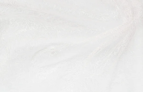 Nahaufnahme aus weißem gefaltetem Stoff — Stockfoto