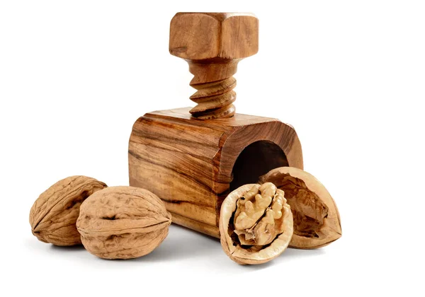 Деревянный хлопушка с орехами — стоковое фото
