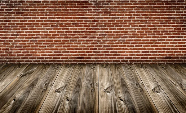 Цегляна стіна з дерев'яною підлогою — стокове фото