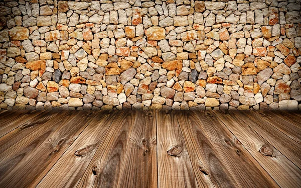 Кам'яна стіна з дерев'яним підлоговим фоном — стокове фото
