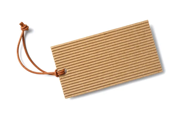 Картонная этикетка с кожаным шнуром — стоковое фото