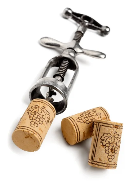 Vintage corkscrew with corks — Stock Photo, Image