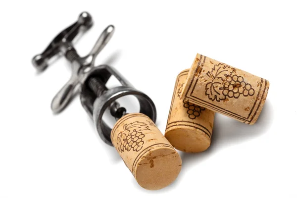 Wine bottle corks with vintage corkscrew — Stock Photo, Image