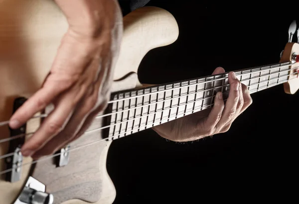 Hands playing bass guitar — Stock Photo, Image