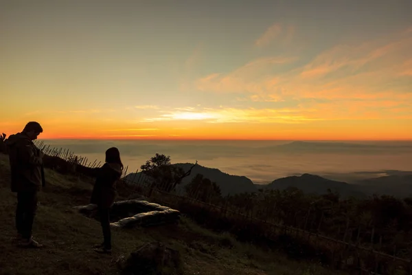Traveler on mountain before sunrise in the morning — Stock Photo, Image