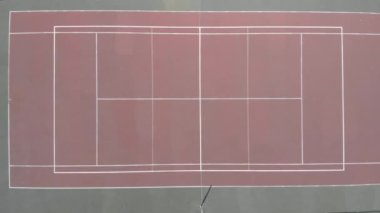 Aerial top down view of tennis court. Playground in Park